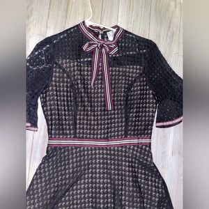 Black see through with nude slip, high neck with tie around the waistline